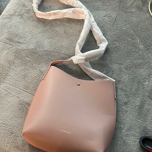 Pink cross body bag